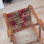 Antique wooden footstool with woven seat Image 4