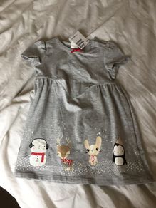 Bnwt lovely dress with fun characters on it