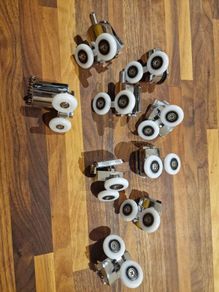 Shower door rollers