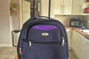 small navy suitcase