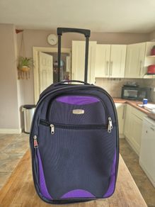 small navy suitcase