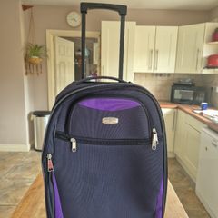 small navy suitcase