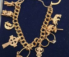 Vintage 9ct yellow gold charm bracelet