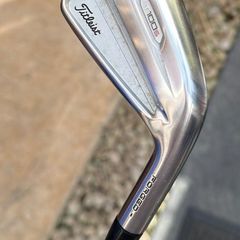 Titleist T100s irons.