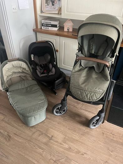 Nuna travel system including isofix base
