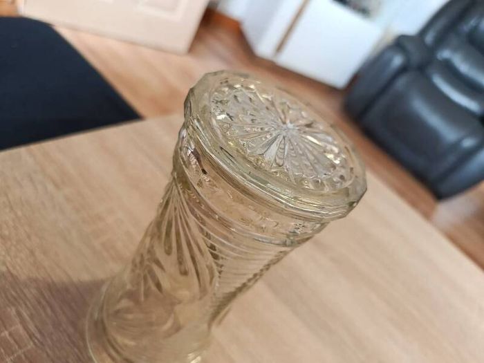 Antique pressed glass celery vase with embossed text
