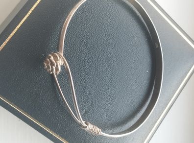 Vintage sterling silver bracelet with a rose-shaped clasp.