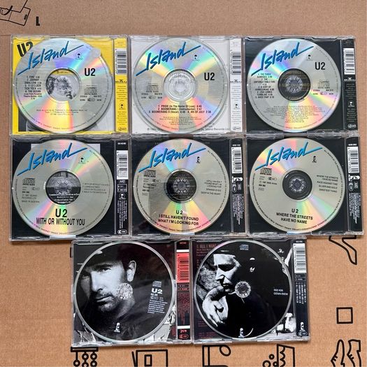 U2 cd singles x 8 ( 80's 84/89 )