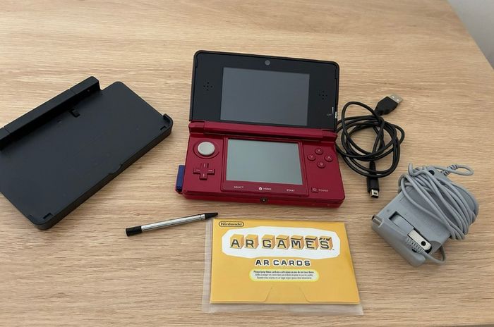Flame Red Nintendo 3DS (NTSC-U), Tetris Axis, and sealed AR cards