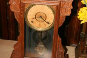 Antique Mantel Clock made by Waterbury AMERICAN GINGERBREAD CLOCK Carved Oak Case 59 x 35cm works well