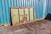 Grain trailer back door