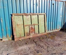 Grain trailer back door