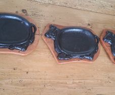 Cast iron cow shaped sizzle platters