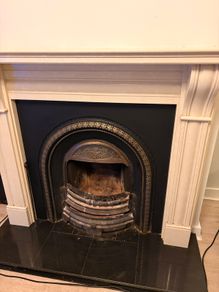 Fireplace stone with cast iron insert