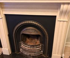 Fireplace stone with cast iron insert