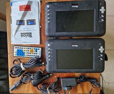 Tevion Twin car DVD Player with accessories and Manual, not tested