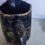Victorian pottery pitcher. Gloss black glazed pitcher with ivy leaf design in green Image 4