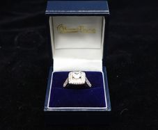 Sterling silver 925 halo engagement ring with square cubic zirconia and side stones