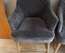 3 cushioned grey island chairs