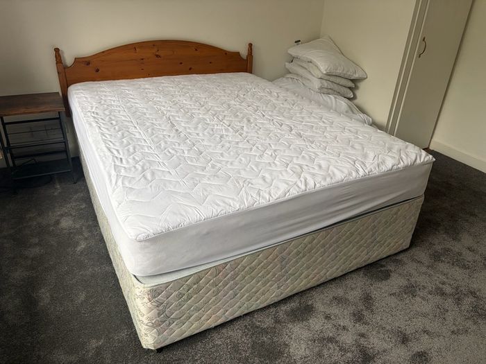 5ft Bed that splits on two. Includes the mattress and headboard.