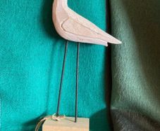 Hand crafted timber bird on metal legs. New