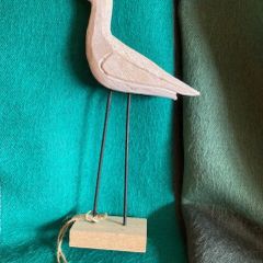 Hand crafted timber bird on metal legs. New
