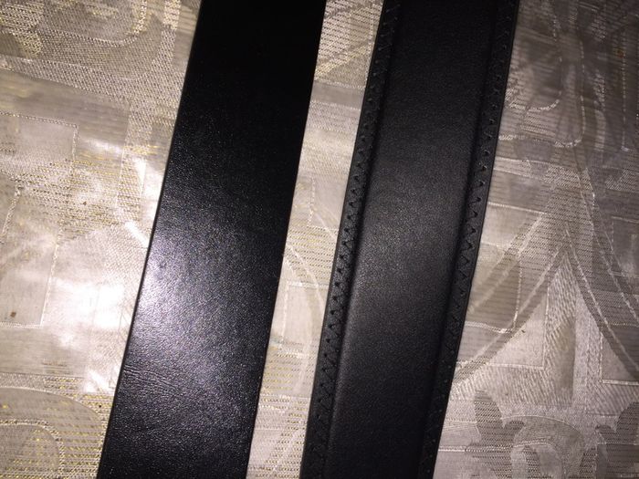 Selecting of men's black/brown belts
