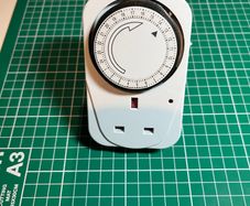 Status 24-Hour Mechanical Plug-in Timer Switch