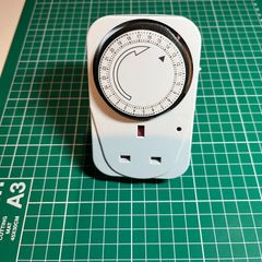 Status 24-Hour Mechanical Plug-in Timer Switch