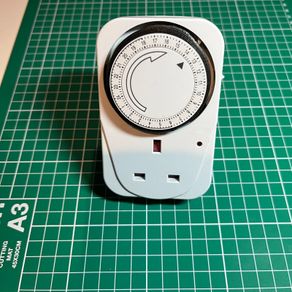 Status 24-Hour Mechanical Plug-in Timer Switch