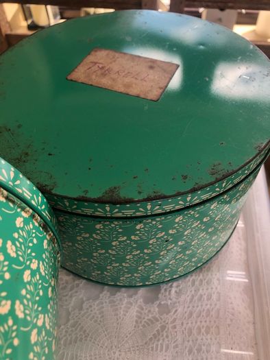 selection of vintage cake storage tins with lids