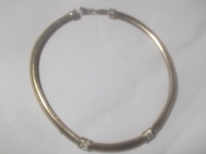 a christian dior necklace gold colour j