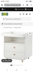 Changing table with drawers