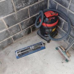 industrial hoover and tile cutter