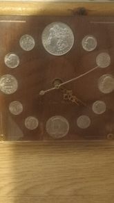 silver Morgan dollar clock