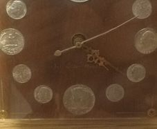 silver Morgan dollar clock