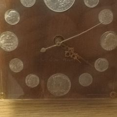 silver Morgan dollar clock