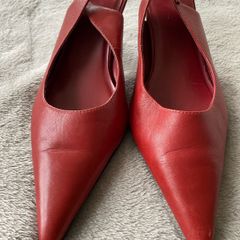 Vintage red sling back shoes.