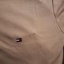 3 Tommy Hilfiger Tshirts (slightly) damaged, with tags never worn. Image 2