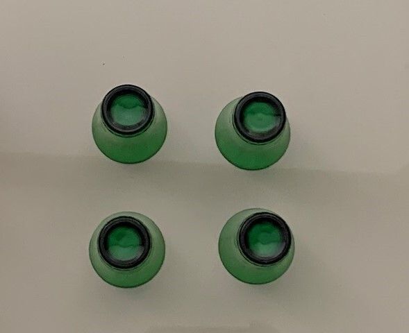 Mid Century green glass liqueur or shot glasses