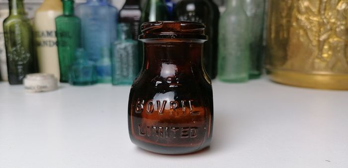 65 - Vintage 4oz Bovril Dark Brown Glass Embossed Letters Jar