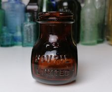 65 - Vintage 4oz Bovril Dark Brown Glass Embossed Letters Jar