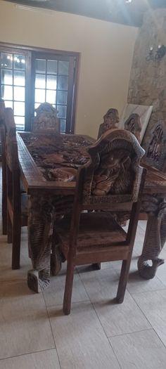 Hand carved African table and chairs with BIG 5