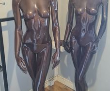 Two female glossy mannequins