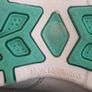 New white shoes with butterfly design Image 3
