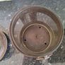 Two rustic pillar candleholders with glass inserts Image 3