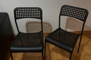 Black plastic chairs