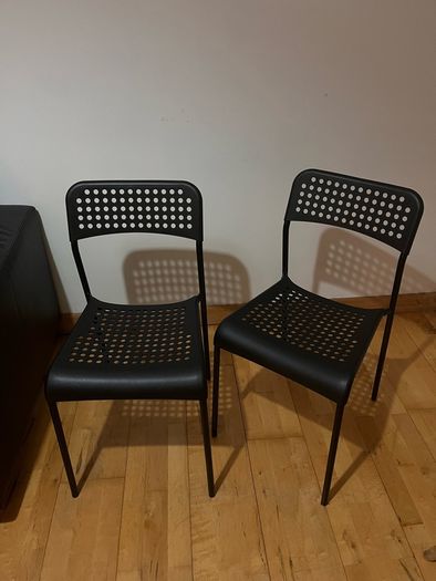 Black plastic chairs