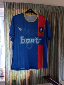 Ted Lasso Bundle - AFC Richmond Lightweight Jersey No. 6 Kent, Believe - Pin Badge & Keyring. Jersey Asian Size 4XL - Similar To 2XL/3XL- Width 63cm, Length 73cm.