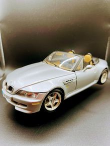 BMW and Jaguar model cars